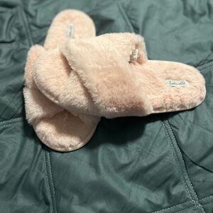 Pink fuzzy slippers
